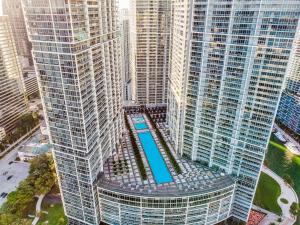 an overhead view of a large building with a pool in it at Moderne 2 bed 2 bath Residence in Miami