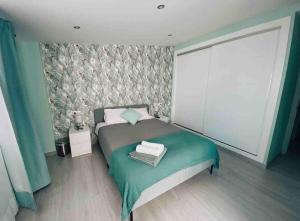 a small bedroom with a bed and a window at CAPISTRANO BREEZE - Luxury Coastal Apartment in Capistrano Village, Nerja in Nerja +23 photos