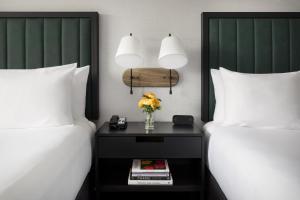 Ένα ή περισσότερα κρεβάτια σε δωμάτιο στο The Arcadian +107 φωτογραφίες