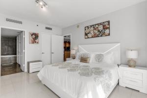 Ένα ή περισσότερα κρεβάτια σε δωμάτιο στο Icon brickell 1 bed 1 bath residence +24 φωτογραφίες