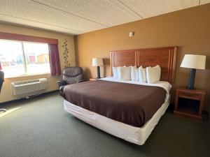 Postel nebo postele na pokoji v ubytování FairBridge Inn & Suites McAlester