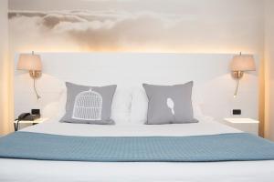 Postel nebo postele na pokoji v ubytování Ariae Dépendance - Alihotels