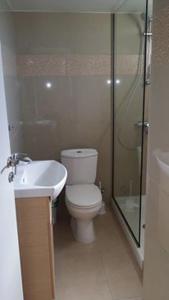 a bathroom with a toilet and a shower and a sink at Simos Magic Hotel Apts in Ayia Napa