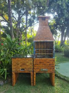 Zahrada ubytování Casa de Temporada Arcádia, Piscina, 22 Hóspedes, 5 Suítes e Churrasqueira em Itacaré na Bahia