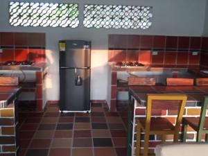 Curitagua Hotel Campestre的厨房或小厨房
