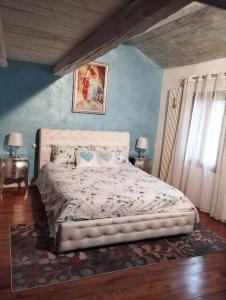 Postel nebo postele na pokoji v ubytování Il Torrione di Lara locazione turistica
