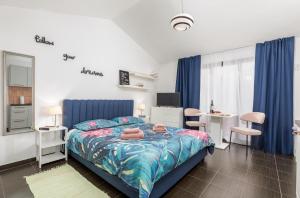 Posteľ alebo postele v izbe v ubytovaní Funcic Apartments 2 app + 32 fotografií