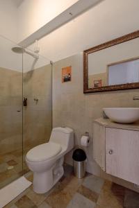 Koupelna v ubytování Bololá Hotel