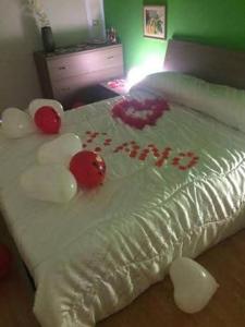 Letto o letti in una camera di Medea rooms palermo centro