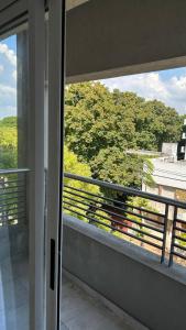 Balkón nebo terasa v ubytování Amplio Departamento de dos habitaciones zona Hospital by Lofter