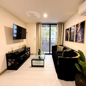 TV a/nebo společenská místnost v ubytování New and Luxurious Apt in Cipreses de San Ignacio