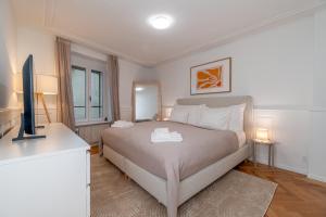 Postel nebo postele na pokoji v ubytování Cosy Suite