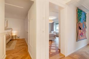 Postel nebo postele na pokoji v ubytování Cosy Suite