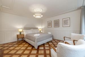 Postel nebo postele na pokoji v ubytování Cosy Suite