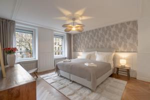Postel nebo postele na pokoji v ubytování Cosy Suite