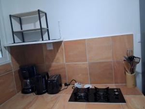 O bucătărie sau chicinetă la T2 Entièrement NEUF L'Escale du Désert