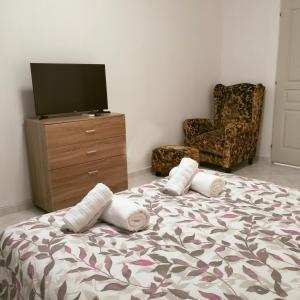 Postel nebo postele na pokoji v ubytování PALIOKTIMA - SLEEP n GO