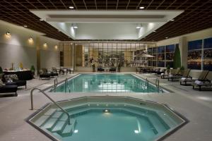 a large swimming pool in a hotel lobby at Caesars Windsor Hotel and Casino in Windsor