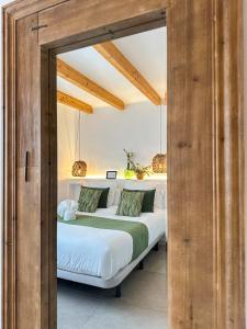 Postel nebo postele na pokoji v ubytování Moona Hostal Altea