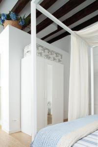 Postel nebo postele na pokoji v ubytování Aria e Luce Suites a Venezia