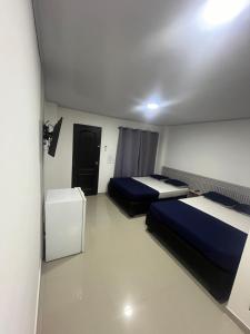 Postel nebo postele na pokoji v ubytování Bless Hotel