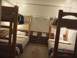 Letto o letti in una camera di HOSTAL La RASA