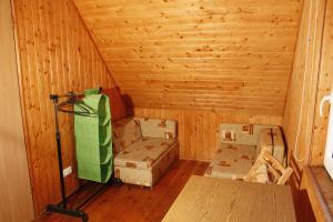 a room filled with boxes in a wooden room at The Jolly Man in Vilnius