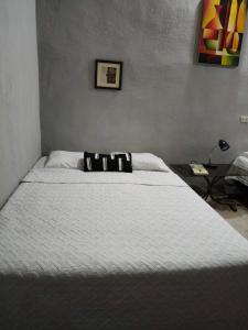 Ένα ή περισσότερα κρεβάτια σε δωμάτιο στο La cuevagt
