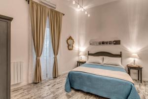 מיטה או מיטות בחדר ב-Loft in San Pietro