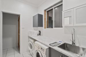 Η κουζίνα ή μικρή κουζίνα στο River Retreat +10 φωτογραφίες