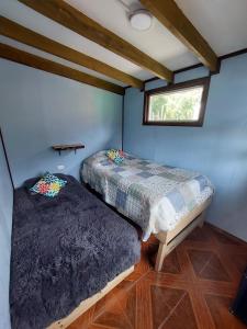 Postel nebo postele na pokoji v ubytování Alojamiento con acceso a PLAYA y Naturaleza