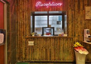 a restaurant with a counter and a window at February Hotel Gimhae in Gimhae +127 photos