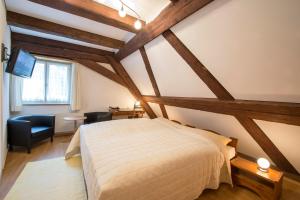 Säng eller sängar i ett rum på Landgasthof Ochsen