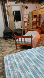 Ένα ή περισσότερα κρεβάτια σε δωμάτιο στο Habitacion - Tercio