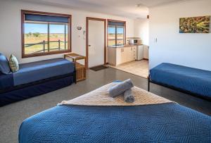 Ένα ή περισσότερα κρεβάτια σε δωμάτιο στο Cheela Plains Station Stay