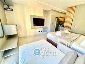 Ένα ή περισσότερα κρεβάτια σε δωμάτιο στο Simple Smart Residence By 123Quarto Hospedagem