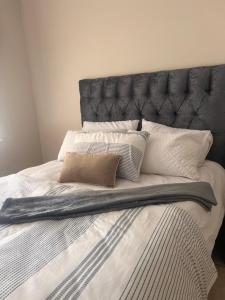 Ένα ή περισσότερα κρεβάτια σε δωμάτιο στο Tesco Accommodation