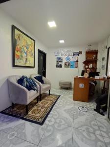 Posezení v ubytování L'Vanna Hotel