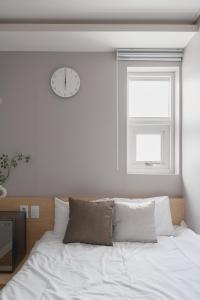 Dawoo House 2 in Hongdae房間的床 +28 張相片