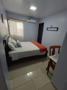 Letto o letti in una camera di L'Vanna Hotel