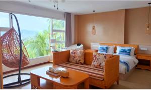 Prostor za sedenje u objektu Puerto Galera Seaview Resort +72 fotografije