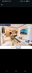 a picture of a living room on a boat at GRAND DIAMOND BEACH Tonsupa Atacames in Tonsupa
