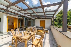 Posezení v ubytování Anji Bamboo Homestay