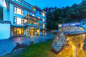 Zahrada ubytování Anji Bamboo Homestay