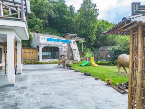 Zahrada ubytování Anji Bamboo Homestay
