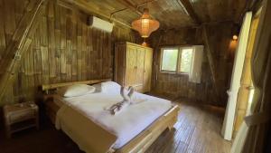 Postel nebo postele na pokoji v ubytování Samada Work Life Canggu