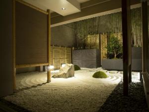 Postel nebo postele na pokoji v ubytování Hotel Keihan Kyoto Grande