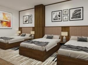 Ένα ή περισσότερα κρεβάτια σε δωμάτιο στο Bich Phuong Hotel
