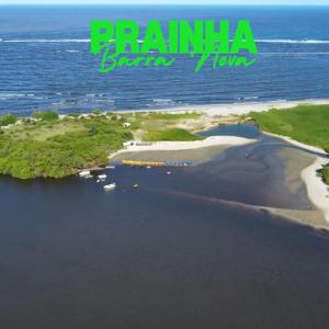 an island in the ocean with the words panama burn town at Casa por temporada Barra Nova in Marechal Deodoro