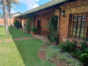 Сад в BauHouse Comfort Suites Asuncion